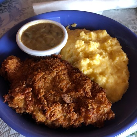 Homegrown signature dishes Fried Buttermilk Chicken, BBQ Glazed Tempeh, NC Fried Catfish.